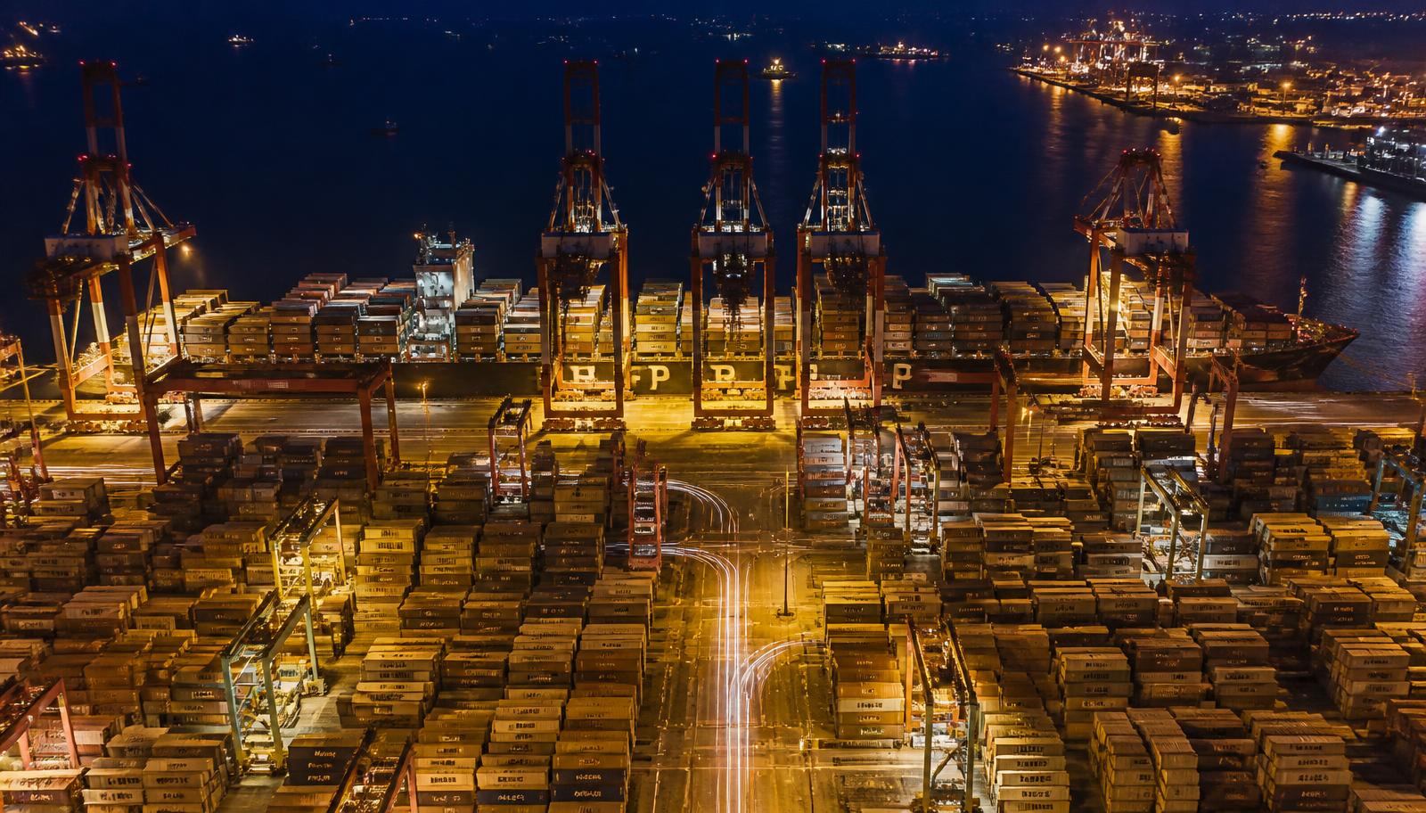Illuminated container port terminal at night